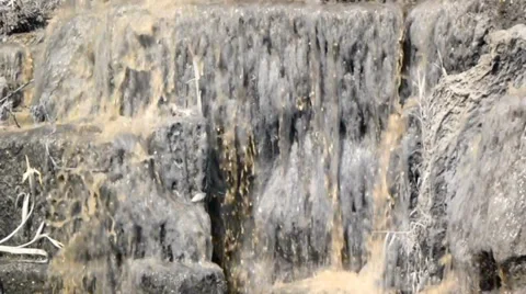 Cold Splashing Water Cascades down Rocks Video stock 38410508