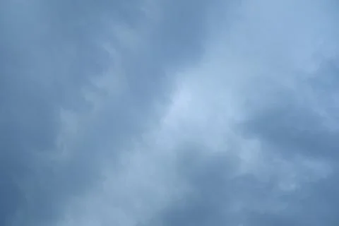 Cold spring clouds on a heavy blue sky Foto stock