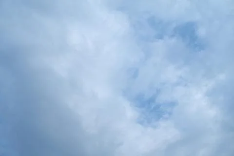 Cold spring clouds on a heavy blue sky Foto stock