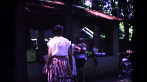 COLD SPRINGS NEW YORK USA-1963: People Gathered At A Function Or Reunion Under A 動画素材 123768344