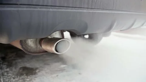 Cold start of a gasoline engine in subzero temperatures in winter. Close-up of Stock Footage 169075344