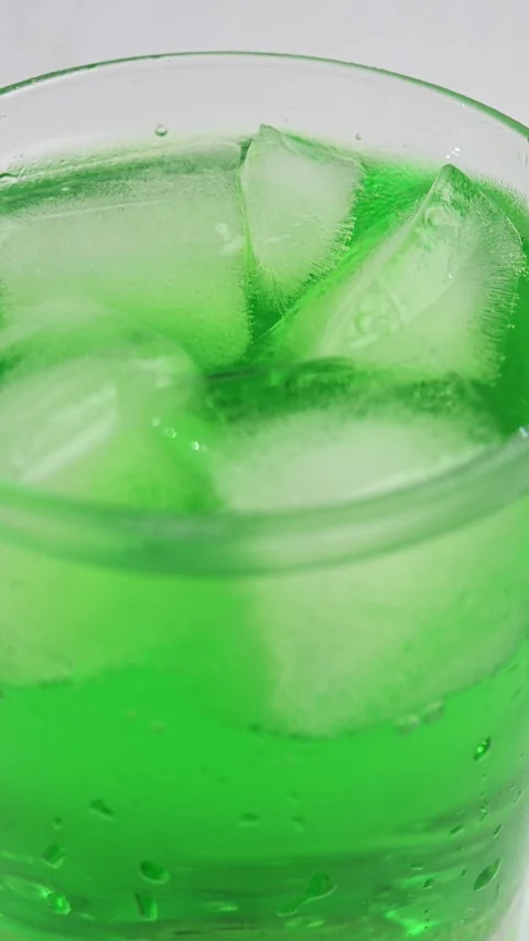 Cold summer drinks with ice and condensation drops on glass surface. Video stock 311693249