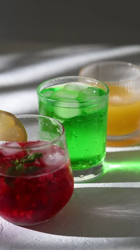 Cold summer drinks with ice and condensation drops on glass surface. Video stock 311693260