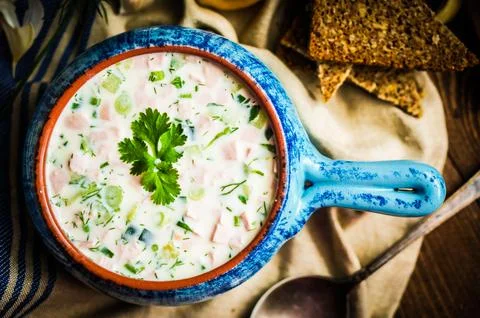 Cold summer soup on rustic background Stock Photos