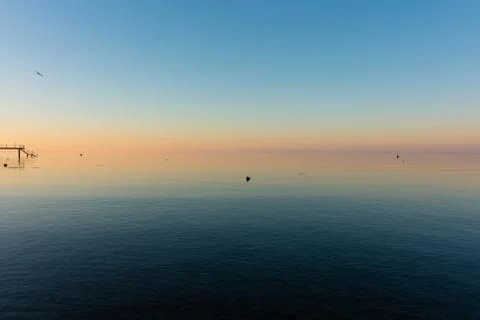Cold sunset at a lake Stock Photos