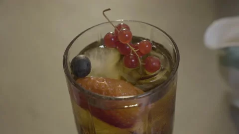 Cold tea with ice and fruit 動画素材 220852364