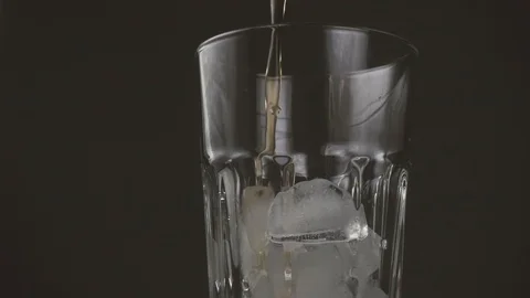 Cold tea pours on the ice Stock-Footage 87609930