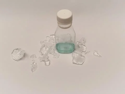 Cold Toxic Blue Potion Bottle on Ice for Halloween Concept Stock Photos
