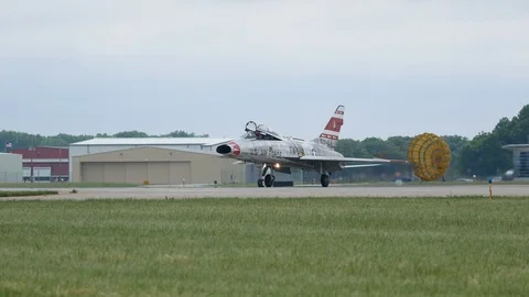 Cold War era USAF F-100 Super Sabre taxis by Stock Footage 111846354
