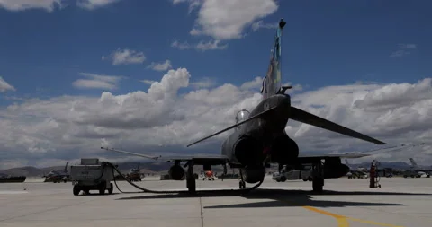 Cold War fighter plane parked for refueling. View from the rear Stock Footage 201255628