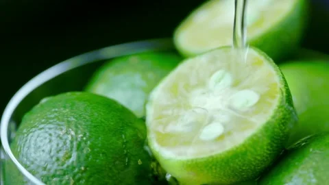 Cold water, fresh lemons, closeup Stock Footage 157265285