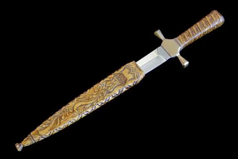 Cold weapon on black background Stock Photos