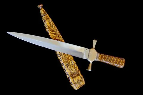 Cold weapon on black background Stock Photos