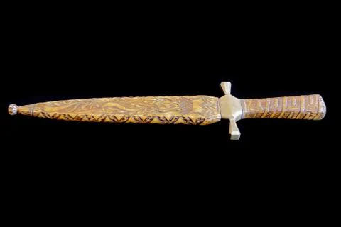 Cold weapon on black background Stock Photos