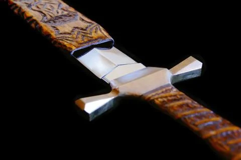 Cold weapon on black background Stock Photos