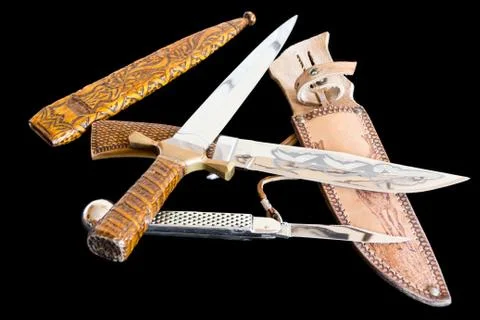 Cold weapon on black background Stock Photos