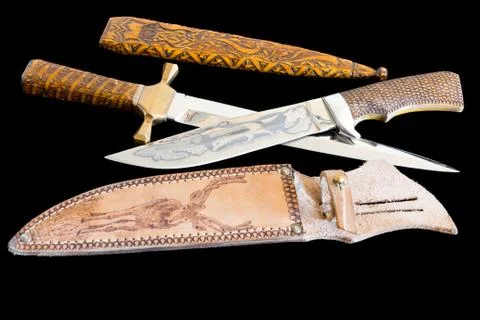 Cold weapon on black background Stock Photos