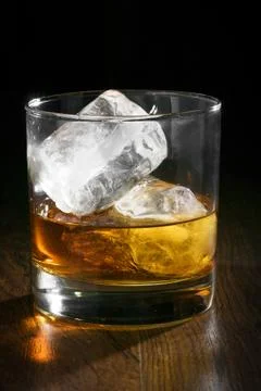 Cold whiskey with ice Stock Photos