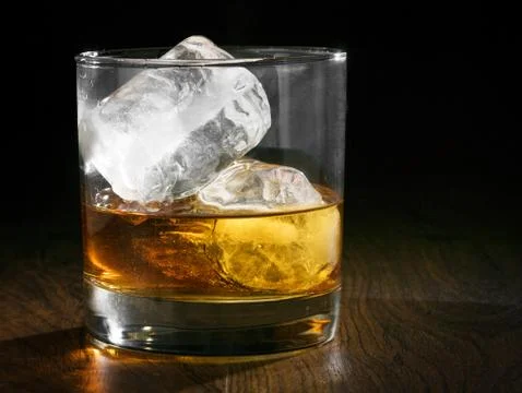 Cold whiskey with ice Stock Photos