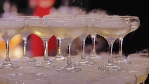 Cold wine on the buffet table, people drink and bite Stock Footage 122060073