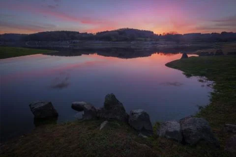 Cold winter sunset over the river Stock Photos