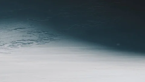 Cold winter wind blows snow with icy snow on the background. Tripod shot. Stock Footage 94060742