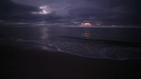 Cold winter windy Baltic sea coast beach in twilight purple light with dramatic Stock Footage 145955948