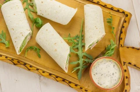 Cold wraps filled with ham and lettuce Stock Photos