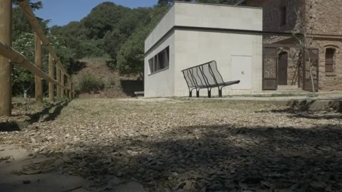Coll Estenalles info office low angle bench forest mountain Sant Llorenc Stock Footage 321348535