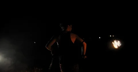 Coll fire show artist having a performance during late sunset, swinging fire Video stock 101009452