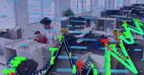 Collaborating analyst and supervisor reviewing monitors in office area, with Stock Photos