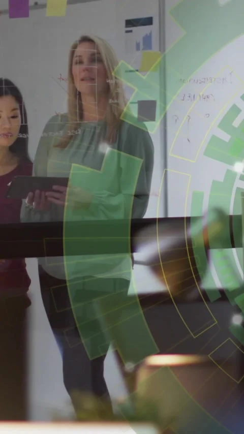 Collaborating on animation project, team using digital data visualization in Stock Footage 344285299