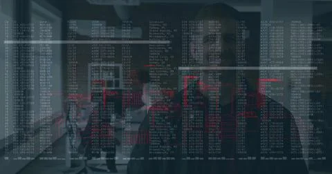 Collaborating colleagues analyzing code and data overlays in meeting room, with Foto stock