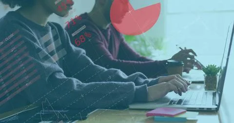 Collaborating colleagues analyzing data charts on laptops at office, with coffee 写真素材