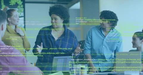 Collaborating colleagues discussing software development in office meeting ro Stock Photos