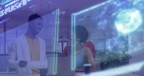 Collaborating coworkers analyzing holographic code interface in office with 写真素材