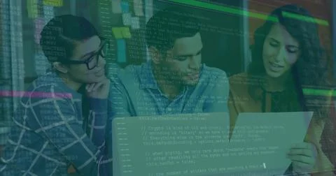 Collaborating developers debugging code at workspace, with laptop, code sheets Stockfoto's