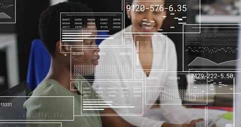 Collaborating with digital data, diverse colleagues in office working on project Stock Footage 329367144