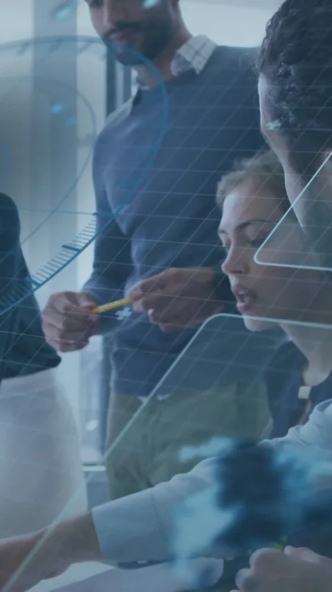 Collaborating with digital interface overlay, business team analyzing data in Stock Footage 319727427