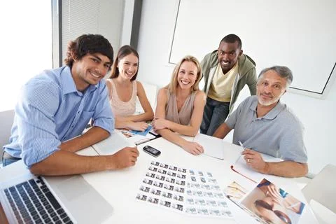 Collaborating on an exciting project. A diverse group of business colleagues Stock Photos