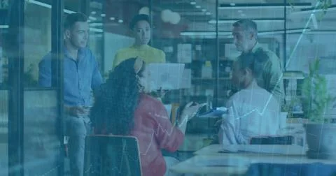 Collaborating five member team discussing financial data in office, with laptop Fotos de archivo