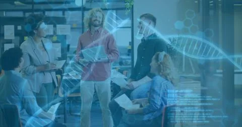 Collaborating five professionals exchanging ideas in open-plan office, with DNA Foto stock