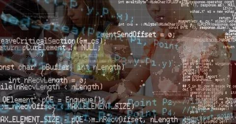Collaborating four girls typing code around laptop in modern classroom, with Foto stock