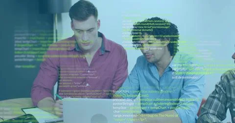Collaborating men reviewing code on silver laptop in conference room, with 스톡 사진