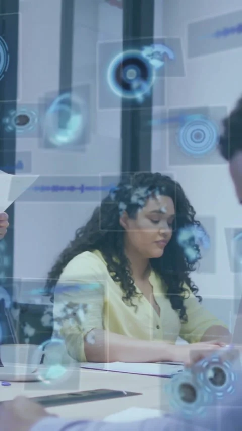 Collaborating in office, business team analyzing digital data with animation Stock Footage 319727438