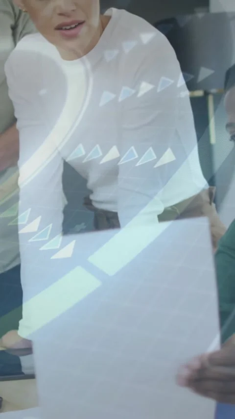 Collaborating over documents, diverse team in office with digital data animation Stock Footage 319071979