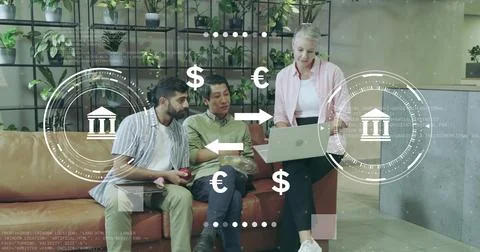 Collaborating professionals analyzing currency exchange in office lounge with Stock Photos