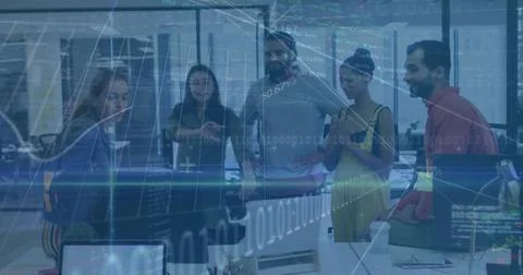 Collaborating professionals in business attire analyzing data in office, with Stock Photos
