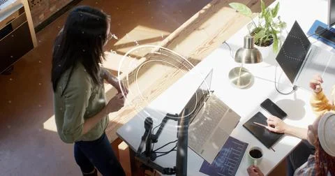 Collaborating software developers analyzing code and data charts in office, w 스톡 사진