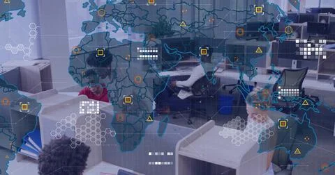 Collaborating team analyzing data at open?plan office, with dual monitors, wo Fotos de archivo